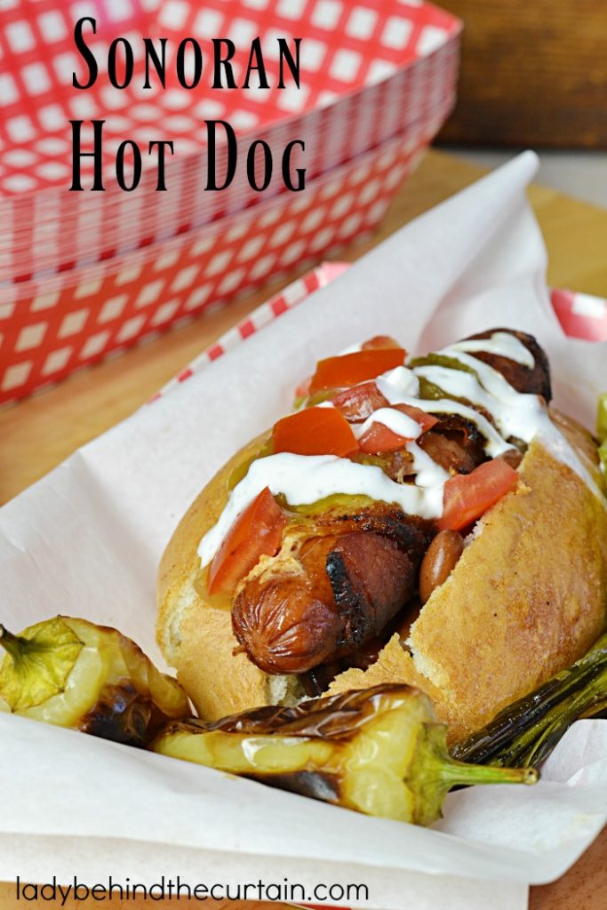 Sonoran Hot Dog | A beef hot dog wrapped in bacon, grilled with an assortment of toppings. The BEST hot dog I've EVER had!