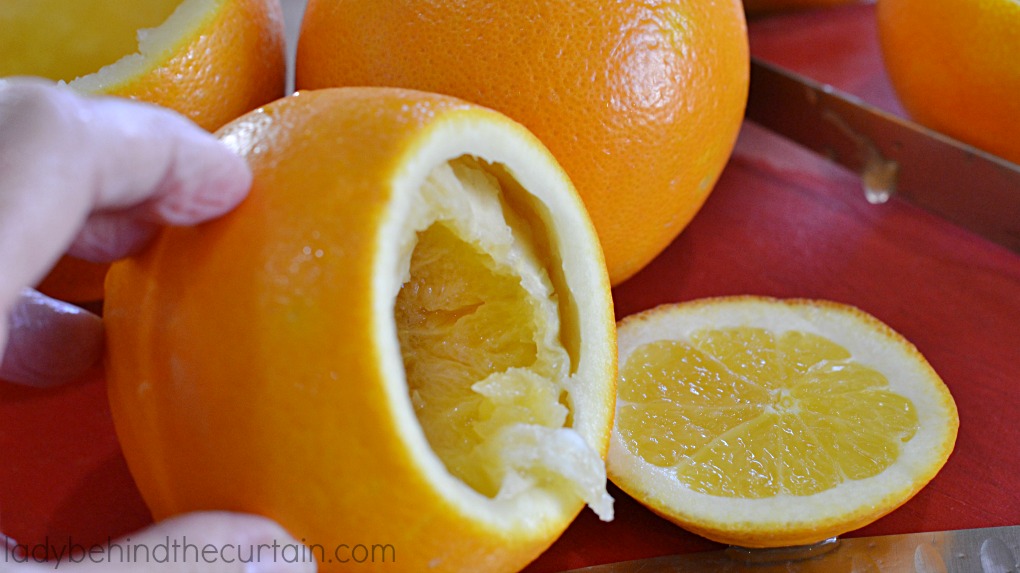 Holiday Citrus Votive Holders | Add the fresh scent of citrus to your holiday table, buffet or bathroom with this inexpensive easy to make votive holders.