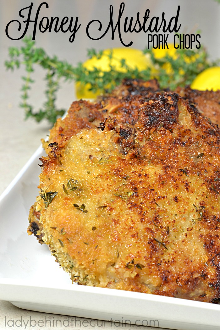 Honey Mustard Pork Chops | Who doesn't love a pork chop that is packed with layers of flavor? I know I do.....that's why this is my all time favorite pork chop recipe. Starting with a honey mustard coating and the perfect crust combination of bread crumbs, thyme and lemon zest. These chops were just as good the next day as the first.