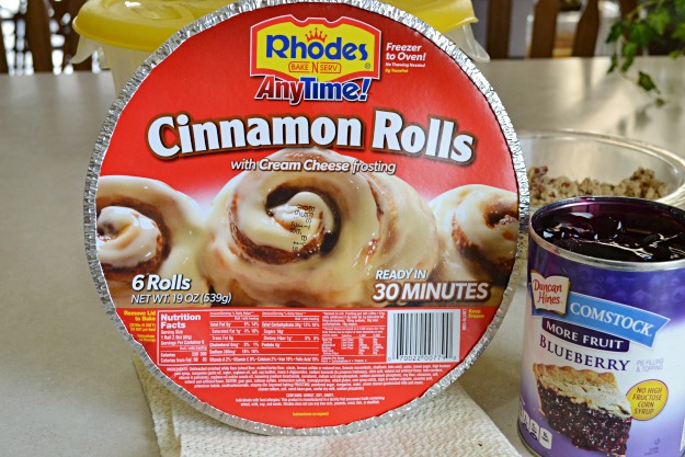 A simple way to serve your family an outstanding breakfast treat. Starting with store bought cinnamon rolls, blueberry pie filling and the best crunchie topping. It's one of my families favorite breakfasts!