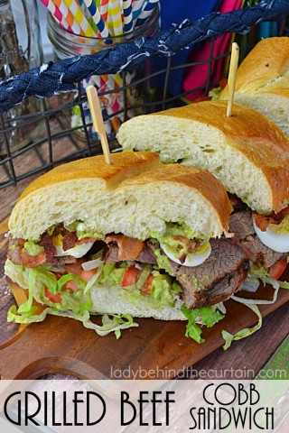 Grilled Beef Cobb Sandwich | A giant sandwich filled with tender grilled beef, lettuce, boiled eggs, tomatoes and bacon topped with a delicious avocado ranch spread.