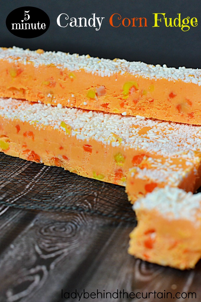 5 Minute Candy Corn Fudge | With chunks of soft and chewy marshmallow candy corn sprinkled throughout this fudge you couldn't ask for a better fudge to give out to friends.