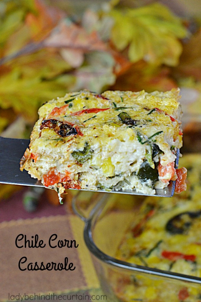 Chile Corn Casserole | A creamy delicious side dish perfect for your holiday table. With a mixture of corn, roasted pasilla and red peppers the flavors can not be beat!