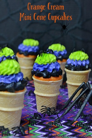 Halloween Orange Cream Mini Cone Cupcakes | Full of fun and easy to make. Perfect for your Halloween party, cake walk or bake sale.