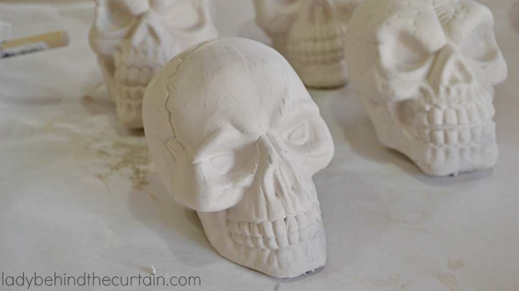 How to Make Halloween Skeleton Head Rattles PLUS Video | Make your own spooky rattles that can be added to a costume or given away as party favors. 