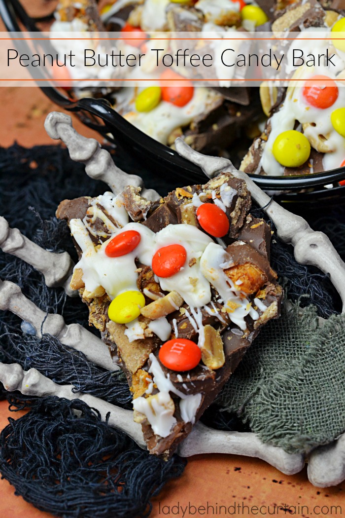 Peanut Butter Toffee Candy Bark | Layers of chopped Butterfinger bars, Heath bars, peanut butter cups, M&M's and peanuts all embedded in chocolate!