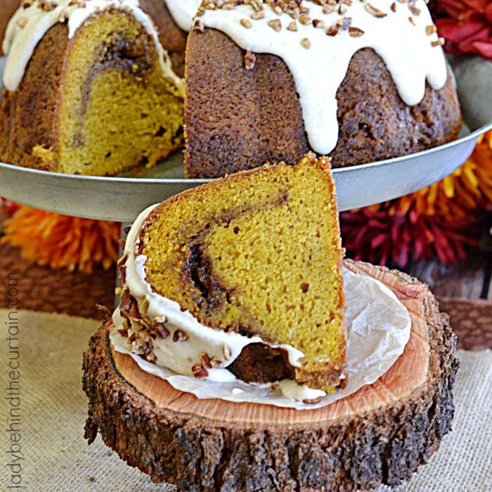 Crunchy Pumpkin Cinnamon Bundt Cake | As if the swirls of cinnamon weren't enough the sweet brown butter glaze on top makes this cake a truly decadent pumpkin treat!