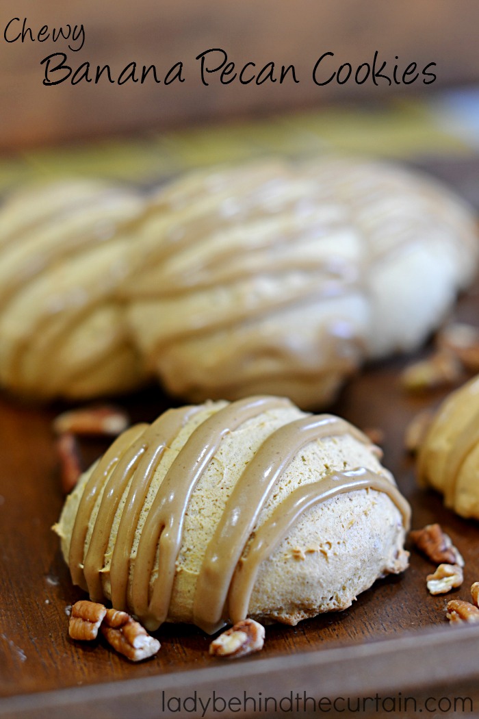 Chewy Banana Pecan Cookies | Giant fluffy cookies full of banana flavor also packed with pecans and topped with a delicious caramel drizzle.