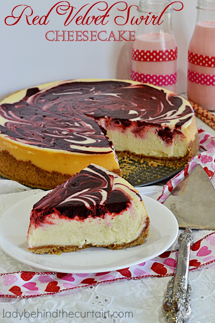 Red Velvet Swirl Cheesecake | A delightful mixture of the timeless red velvet favorite paired with a silky cheesecake.  Simply the perfect Valentine's Day Dessert!