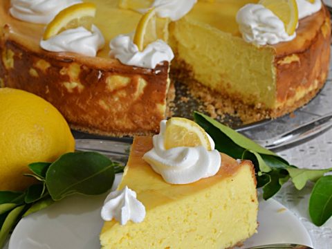 Lemon Pudding Cheesecake | The creaminess of this cheesecake can't be beat with a light flavor of lemon. Serve up summer in style with this light cheesecake. Birthday parties, Mother's Day, Easter......simply the BEST anytime dessert!