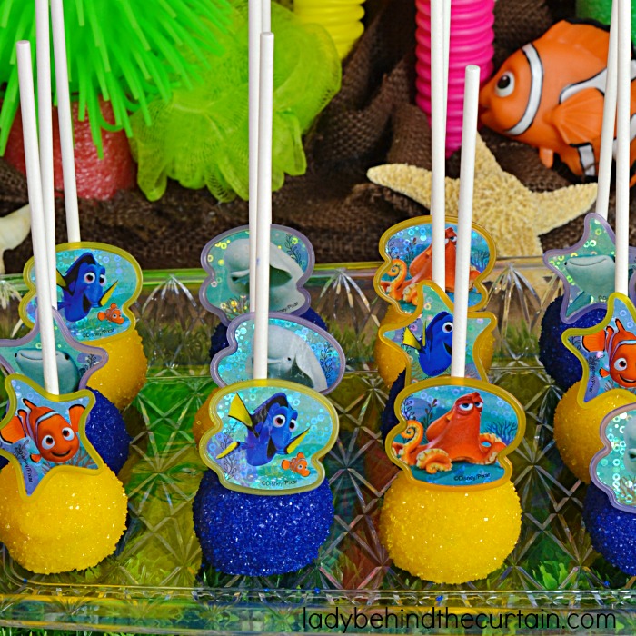 Finding Dory Cake Batter Pops | This 4 ingredient treat is full of fun and makes a sweet party favor or is also perfect on your birthday party table. The best part? These are NO BAKE pops! That's right all you do is add melted butter to a cake mix!