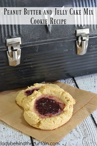 Peanut Butter and Jelly Cake Mix Cookie Recipe | Turn your kids favorite sandwich into a cookie! These peanut butter cookies are filled the raspberry preserves.