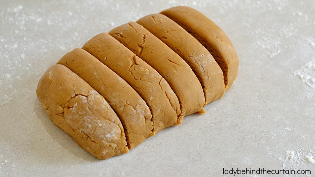 Old Fashioned Stack Cake | With SIX spicy cake layers (more like a gingerbread cookie) and homemade apple butter this cake is sure to be your families new favorite Fall cake.