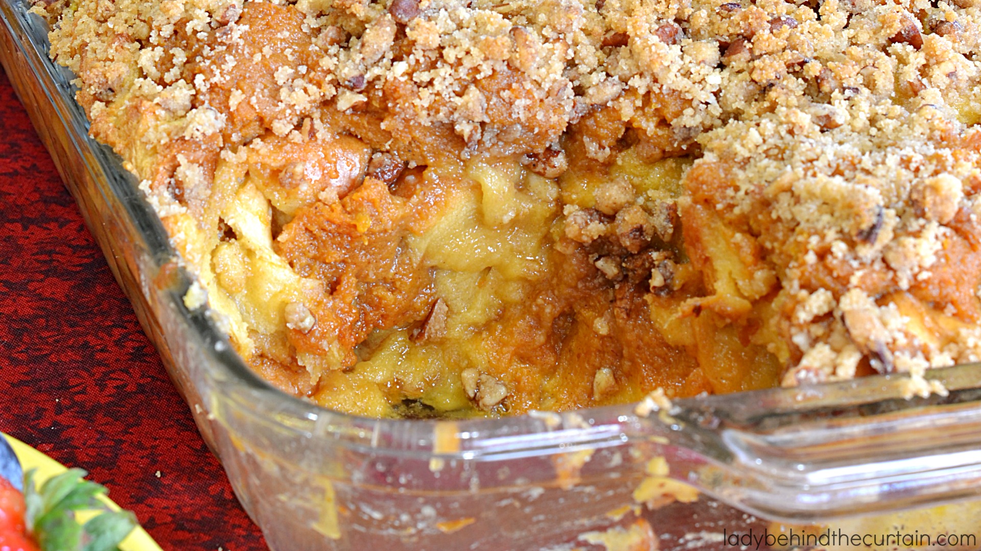Pumpkin Pecan Bread Pudding Recipe | This semi homemade bread pudding is the best! With layers of cream soaked Challah bread, dollops of pumpkin pie and a pecan streusel on top that is to die for. 