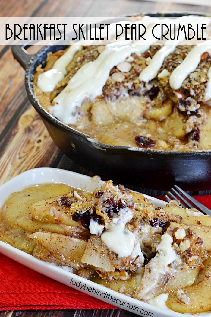 Breakfast Skillet Pear Crumble | This crumble is loaded with tons of pears, a few cranberries, a light crumble and a creamy cheesecake glaze. Perfect for Thanksgiving or Christmas!