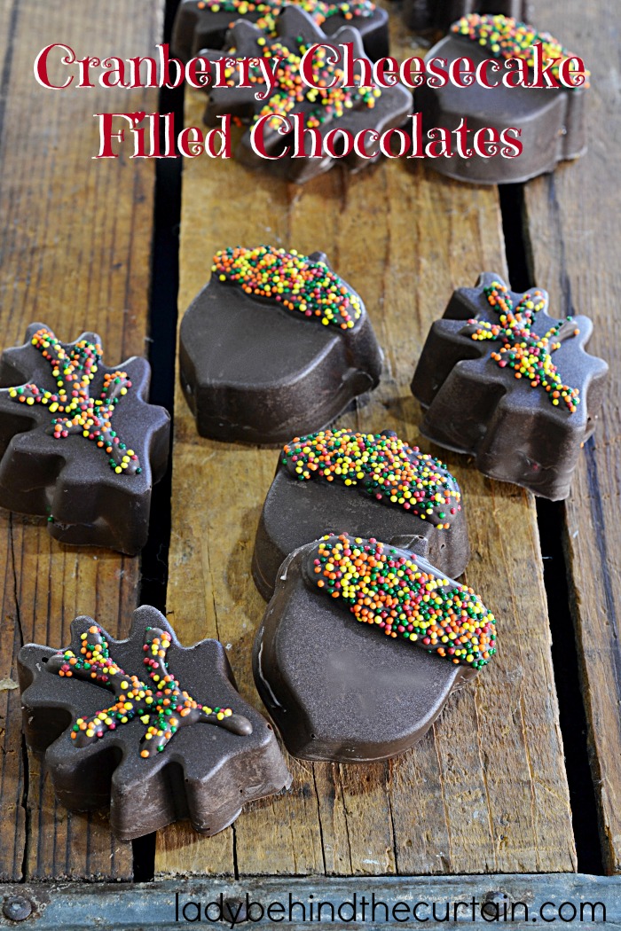 Cranberry Cheesecake Filled Chocolates | These easy to make chocolates are filled with everyone's favorite holiday condiment....cranberry sauce.