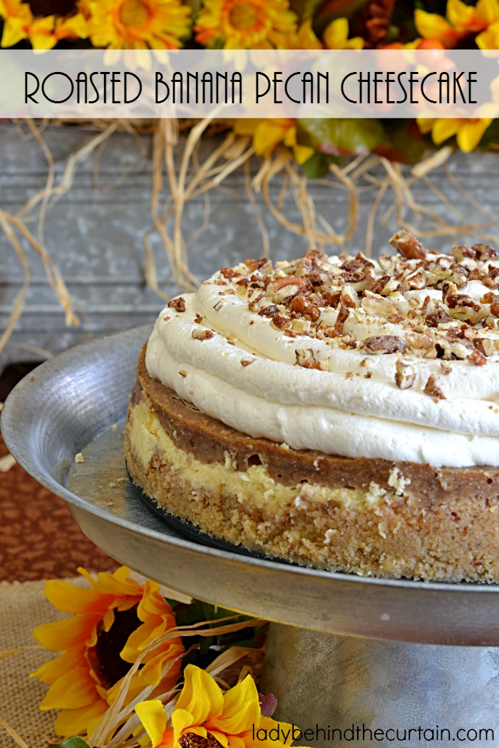 Roasted Banana Pecan Cheesecake | The base of this incredible cheesecake is marbled with mashed roasted bananas and also topped with light and fluffy homemade pecan whipped cream. I'd call that a holiday on a plate!