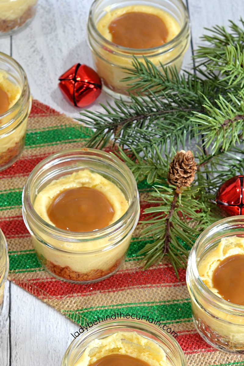 Mini Eggnog Cheesecakes with a Rum Caramel Drizzle
