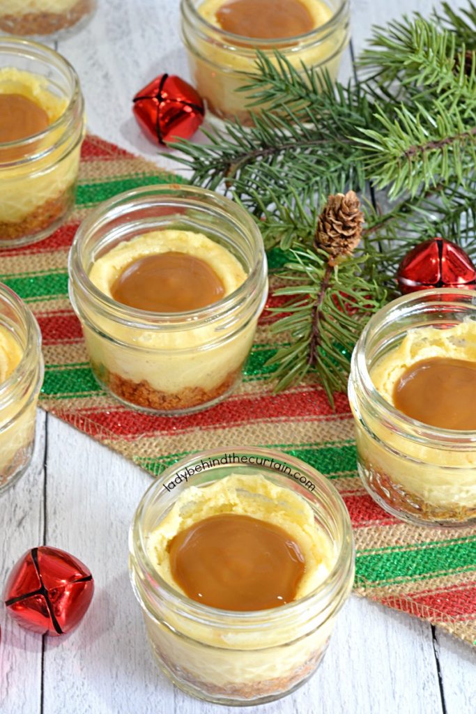 Mini Eggnog Cheesecakes with a Rum Caramel Drizzle