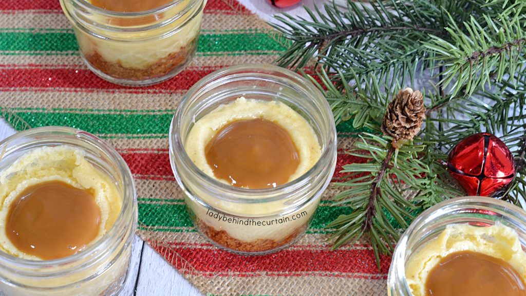 Mini Eggnog Cheesecakes with a Rum Caramel Drizzle