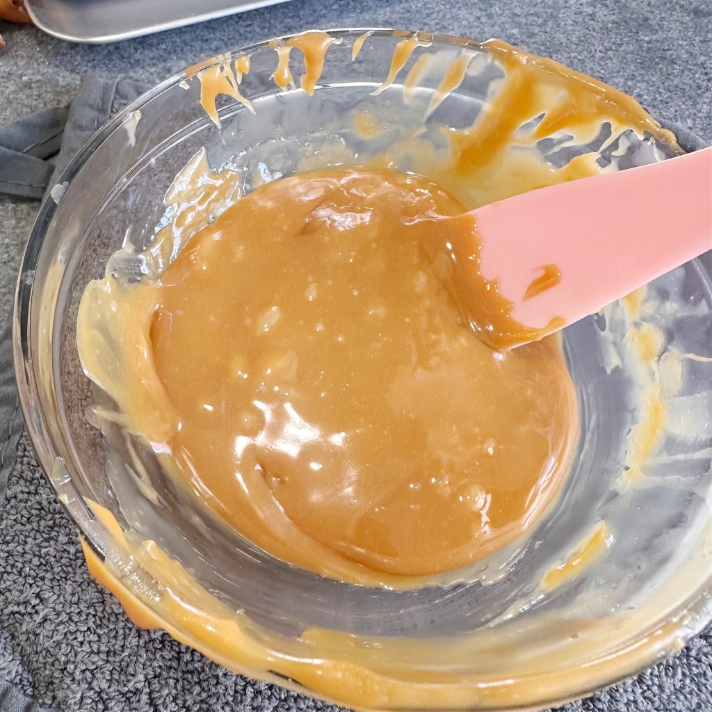 Peanut Butter Pretzel Caramel Candy Bar Bites Dipped in Milk Chocolate
