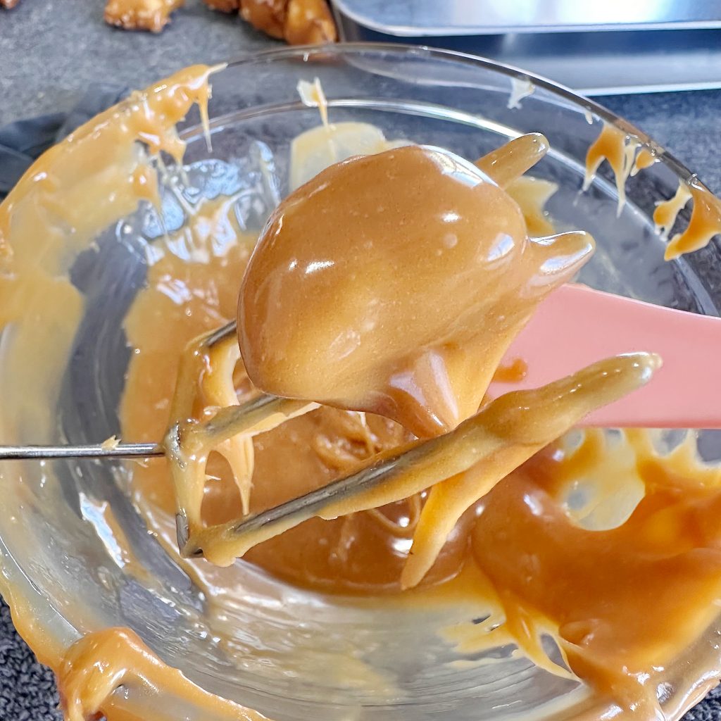 Peanut Butter Pretzel Caramel Candy Bar Bites Dipped in Milk Chocolate